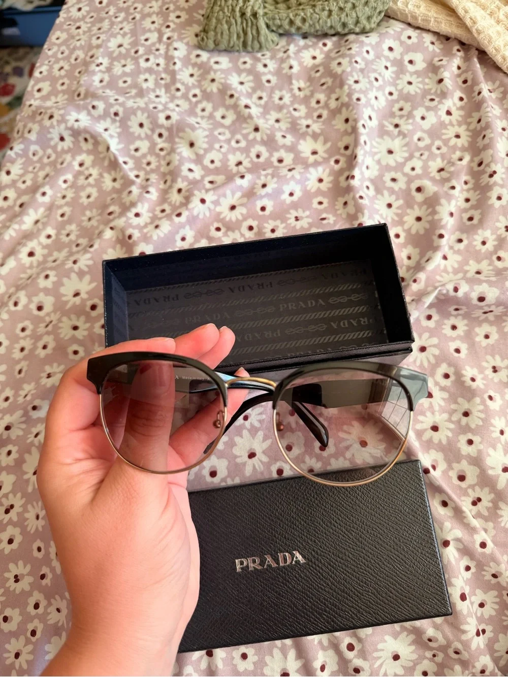 Prada Women’s Black Sunglasses with Gold Trim